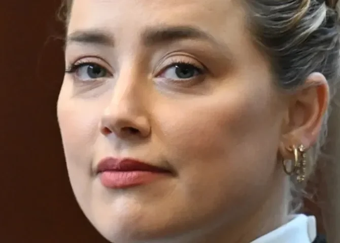   Fotografía de archivo de la actriz estadounidense Amber Heard, que en el día de la madre confirmó el nacimiento de sus mellizos. EFE/Jim Watson/Pool  