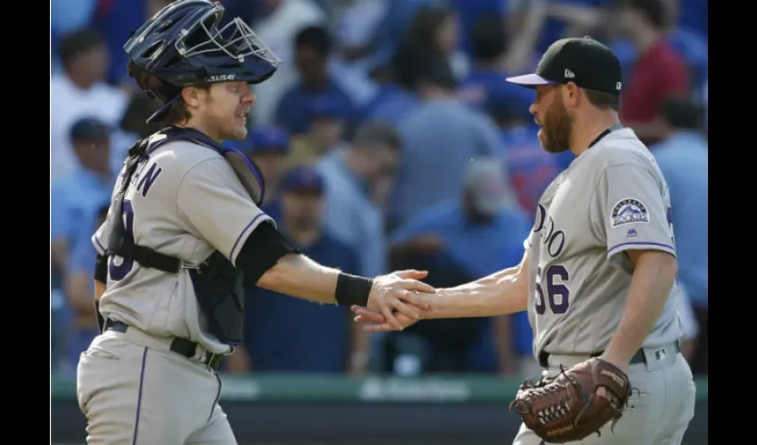 Greg Holland (der.) y el receptor Ryan Hanigan./ Foto AP
