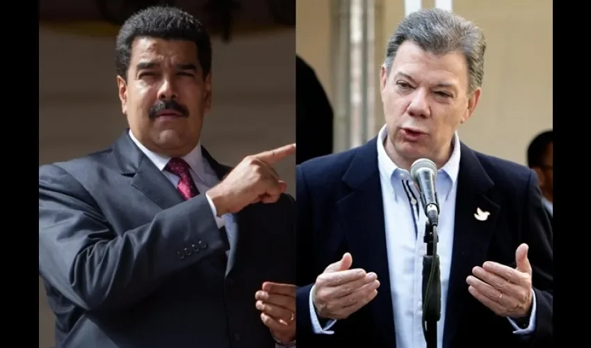 Juan Manuel Santos y   Nicolás Maduro