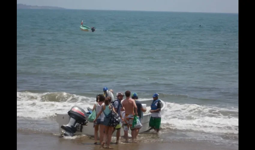 Turistas en isla Iguana. 