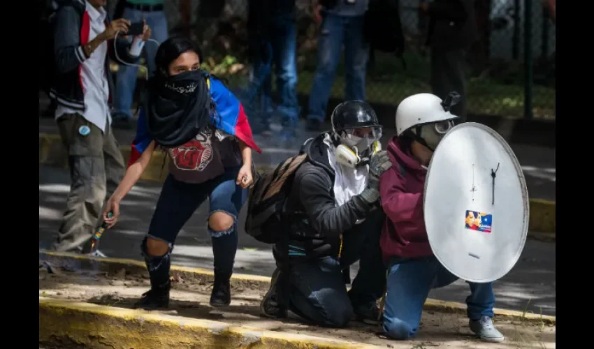 Foto ilustrativa de las protestas por el grupo de universitarios. 