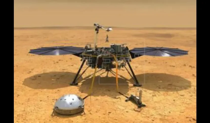 Fotografía cedida por la NASA de una ilustración que muestra una vista simulada del módulo espacial InSight mientras reduce la velocidad a medida que desciende hacia la superficie de Marte. EFE/NASA/JPL-Caltech